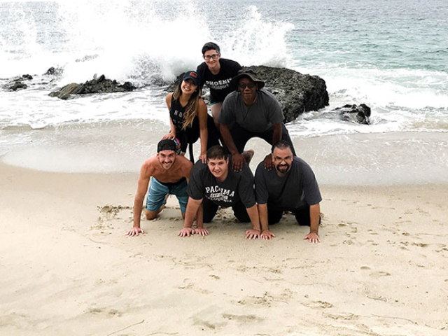 New Start Recovery making an awesome human pyramid at the beach